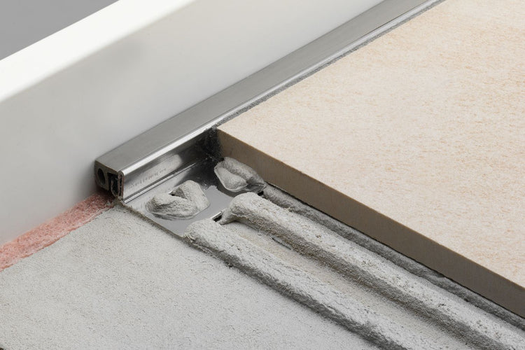 Schluter® DILEX-KSA perimeter joint profile with self-adhesive strip