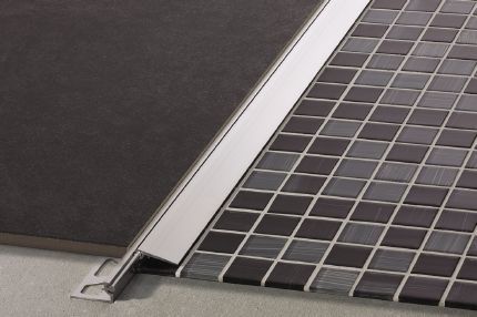 Schluter® RENO-V edge-protection profile with moveable transition arm