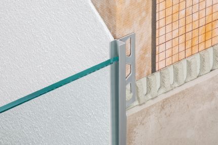 Schluter® DECO-SGC support profile for glass partitions in recessed showers