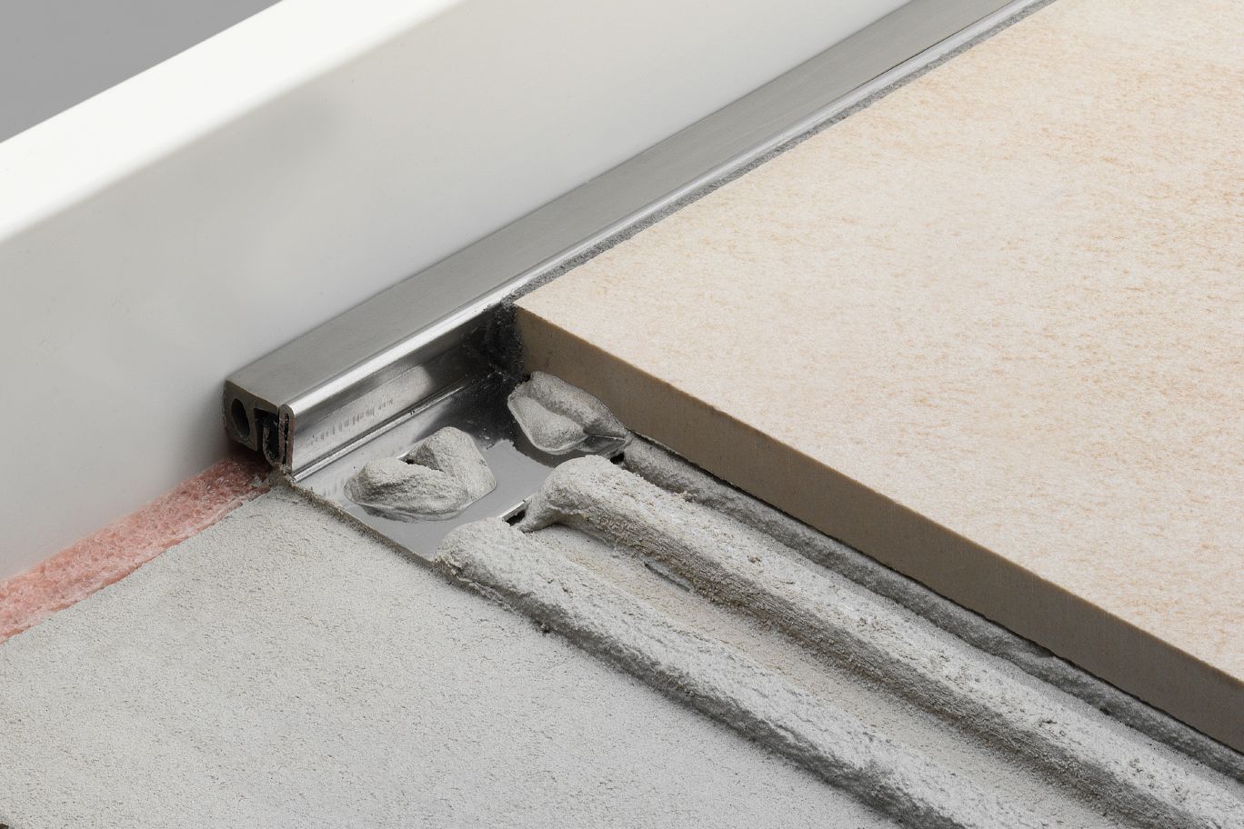Schluter® DILEX-KSA perimeter joint profile with self-adhesive strip