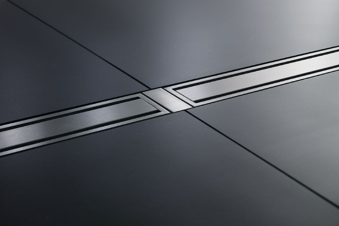 Schluter® KERDI-LINE-FC cover plate used to connect multiple KERDI-LINE drains