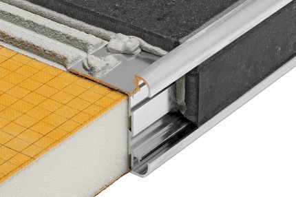 Schluter® RONDEC-CT sink rail profile for countertops with recessed section for bonding tile