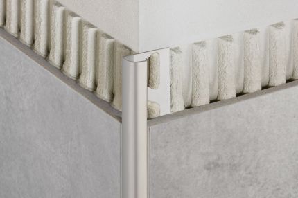 Schluter® RONDEC finishing and edge-protection profile with a rounded reveal surface